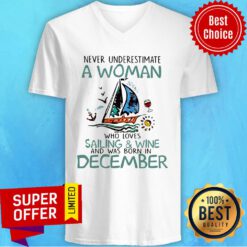 Never Underestimate A Women Who Loves Sailing And Wine Born In December V-neck