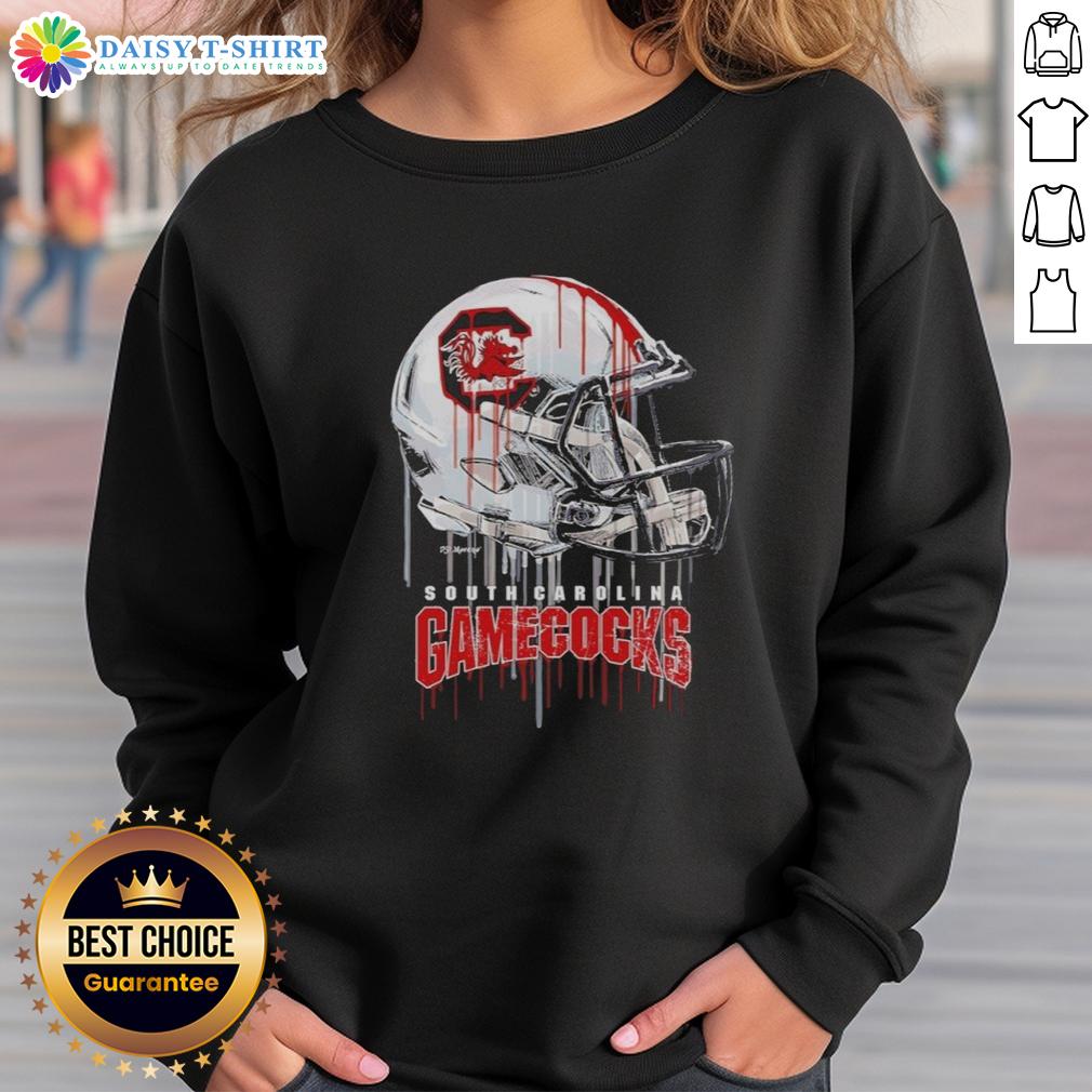 Alt Text: South Carolina Gamecocks sweatshirt featuring a dripping football helmet design, perfect for fans and sports enthusiasts.