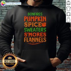 Cozy bonfire scene featuring pumpkin spice sweaters, s'mores, flannels, and hoodies, perfect for autumn gatherings.