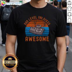 Original Dad Level Unlocked Retro Gamer Sunset T-Shirt design featuring a colorful sunset and vintage gaming graphics.