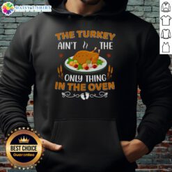 Alt Text: Original Turkey Ain't The Only Thing In The Oven Hoodie featuring a fun graphic design for holiday apparel.