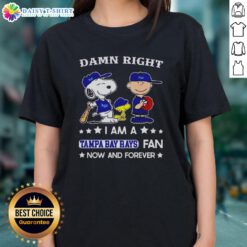Alt Text: Ladies tee featuring Snoopy and Charlie Brown with 'Awesome Damn Right I Am A Rays Fan Now And Forever' design.