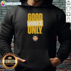 Eugenio Suarez wearing a Seattle Mariners 'Good Vibes Only' hoodie, showcasing team spirit and style.