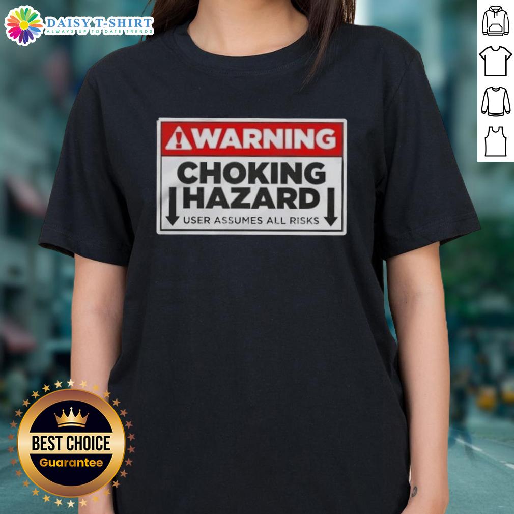 Funny warning label on a ladies tee, highlighting choking hazard and user assumes all risks, perfect for humorous apparel.