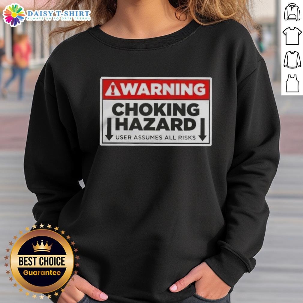 Funny warning choking hazard sweatshirt with playful text, reminding users they assume all risks in a humorous way.