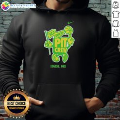 Good Sco Ducks Pit Crew hoodie worn by fans in Eugene, Oregon, showcasing team spirit and style.