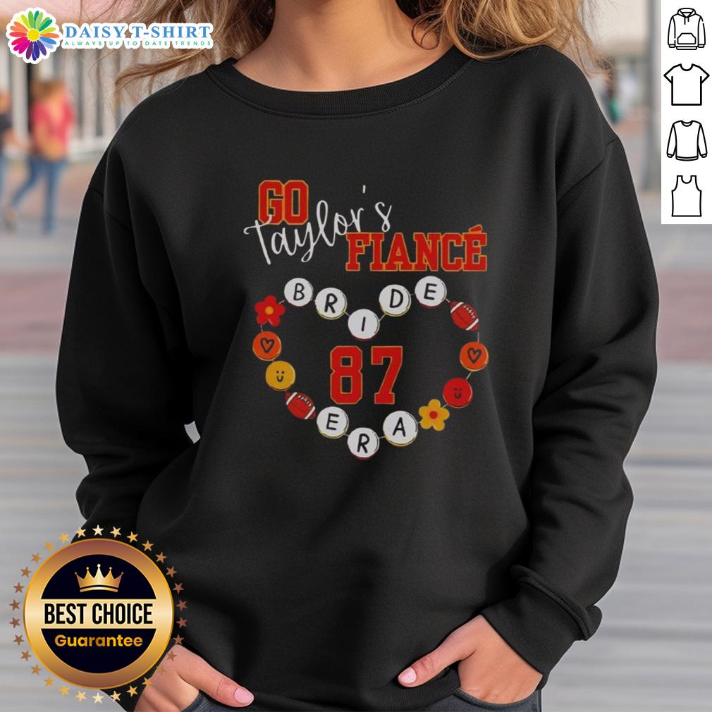 Travis Kelce engagement sweatshirt featuring number 87, perfect for Taylor Swift fans celebrating their love story.