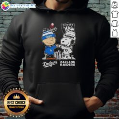 Hot Snoopy and Charlie Brown hoodie featuring Los Angeles Dodgers and Las Vegas Raiders skyline design.