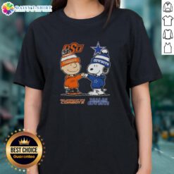 Hot Snoopy and Charlie Brown Oklahoma State Cowboys x Dallas Cowboys ladies tee featuring vibrant graphics and team logos.