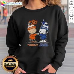 Alt Text: Hot Snoopy and Charlie Brown Oklahoma State Cowboys x Dallas Cowboys sweatshirt featuring vibrant graphics.