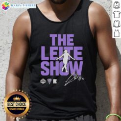 Carla Leite wearing a stylish Golden State Valkyries tank top on 'Hot The Leite Show' set, showcasing trendy sports fashion.