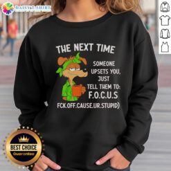 Hot sweatshirt with 'Just tell them to focus' quote, perfect for expressing your feelings in style.