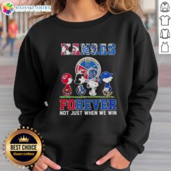 Alt Text: Nice The Peanuts Kansas sports teams sweatshirt, featuring 'Crossing Forever Not Just When We Win' design.