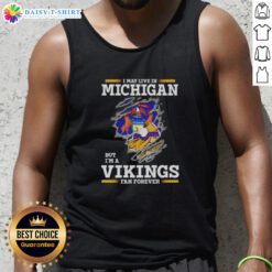 Official I May Live In Michigan But I'm A Minnesota Vikings Fan Forever tank top in vibrant purple and gold design.