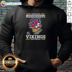 Cozy hoodie with 'I May Live In Mississippi But I'm A Minnesota Vikings Fan Forever' design, perfect for football fans.