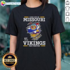 Official I May Live In Missouri But I'm A Minnesota Vikings Fan Forever Ladies Tee featuring team colors and logo.