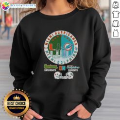Official Miami Sports Hurricanes sweatshirt featuring football helmets and skyline for Saturdays and Sundays.