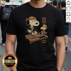 Alt Text: Top Snoopy Woodstock Sushi Tomodachi Club T-Shirt featuring colorful cartoon graphics of Snoopy and Woodstock enjoying sushi.