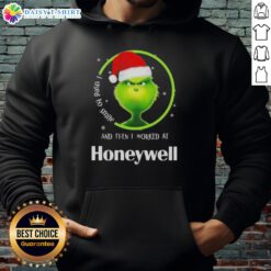 Alt Text: Funny Grinch Christmas hoodie with 'I Used to Smile and Then I Worked at Honeywell' design, perfect for holiday cheer.