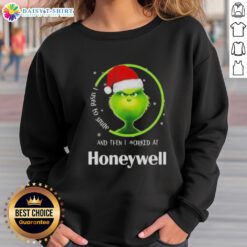 Funny Grinch Christmas sweatshirt with 'I Used to Smile and Then I Worked at Honeywell' design, perfect for holiday cheer.