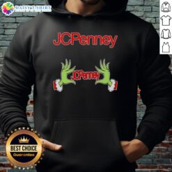 Alt Text: Awesome Grinch hands on a festive JCPenney Christmas hoodie, perfect for holiday celebrations and cozy winter wear.
