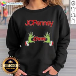 Awesome Grinch hands on a JCPenney Christmas sweatshirt, perfect for festive holiday gatherings and cozy winter style.