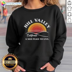 Cozy Awesome Hill Valley Sunset Sweatshirt featuring a vibrant sunset design perfect for casual wear and outdoor adventures.