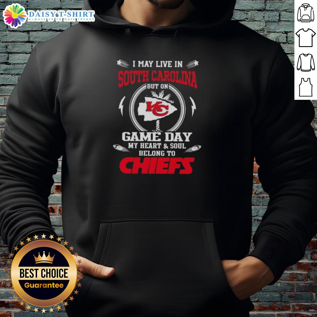 Person wearing a Kansas City Chiefs hoodie, showcasing team spirit on game day in South Carolina.