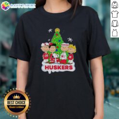 Awesome Peanuts characters on a Nebraska Cornhuskers Christmas ladies tee, perfect for holiday cheer and fan style.
