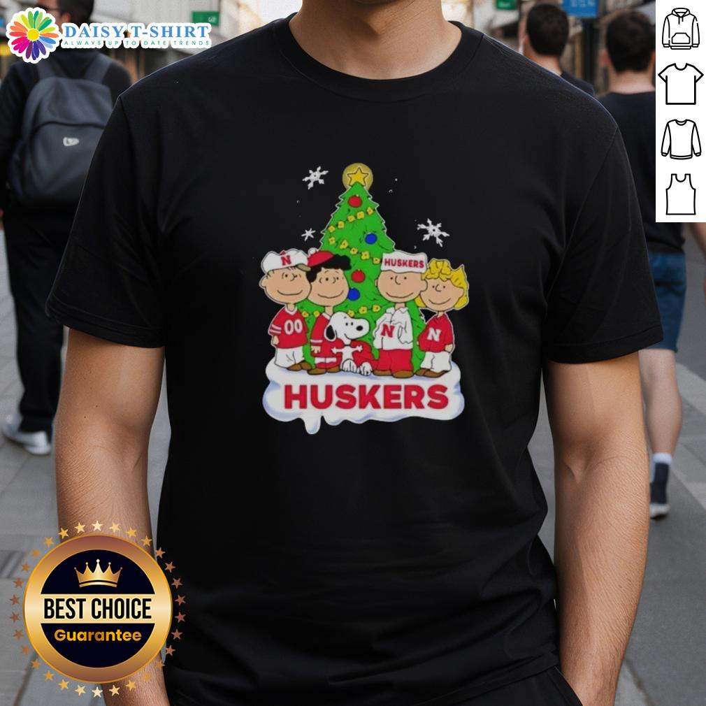 Alt Text: Awesome Peanuts Characters Christmas T-Shirt featuring Nebraska Cornhuskers design, perfect for festive fans.