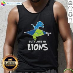 Alt Text: Cute Grinch wearing a Detroit Lions football tank top, showcasing holiday spirit and team pride in a festive setting.