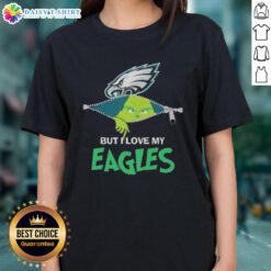 Alt Text: Cute Grinch graphic on a ladies tee, showcasing love for Philadelphia Eagles football in festive colors.