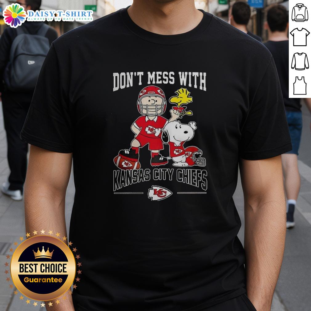 Alt Text: Cute Snoopy and Charlie Brown Peanuts Don't Mess With Kansas City Chiefs football T-shirt design for fans.