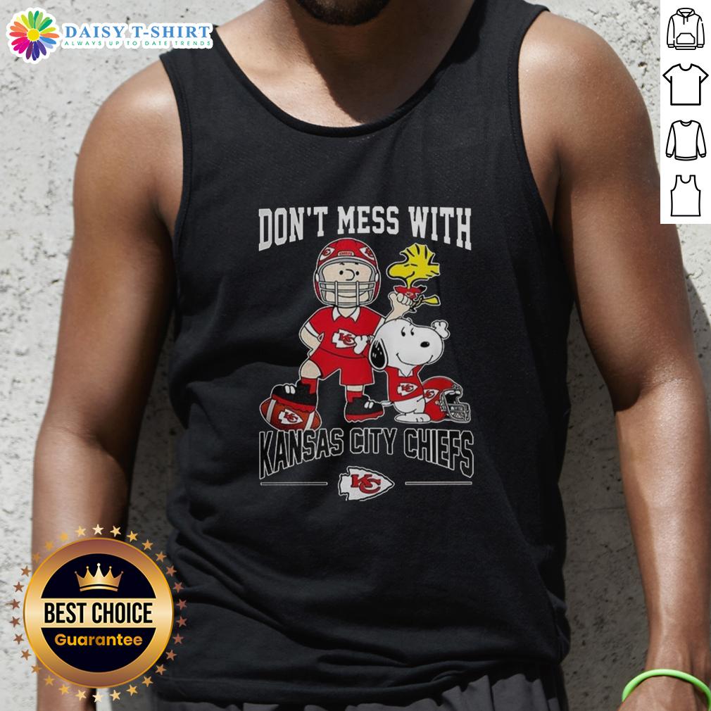 Alt Text: Cute Snoopy and Charlie Brown Peanuts tank top featuring Kansas City Chiefs football design for fans.