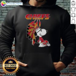 Alt Text: Cute Snoopy wearing a war bonnet with a Kansas City Chiefs football helmet hoodie, perfect for fans and collectors.