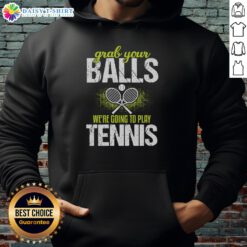 Funny hoodie with Grab Your Balls, We're Going to Play Tennis slogan, perfect for tennis enthusiasts and humor lovers.
