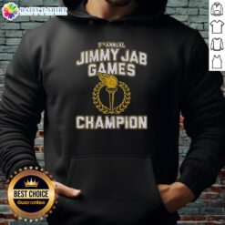 Good 7th Annual Jimmy Jab Games Champion Hoodie displayed on a hanger, showcasing vibrant colors and a unique design.