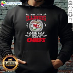 Person wearing a Kansas City Chiefs hoodie, showcasing team spirit and pride on game day in Illinois.
