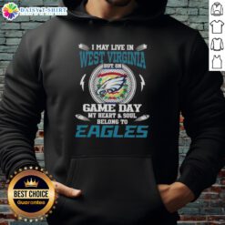 Person wearing a Philadelphia Eagles hoodie in West Virginia, showcasing team spirit on game day.