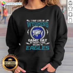 Alt Text: Philadelphia Eagles sweatshirt showing pride for the team, perfect for game day in Wyoming.