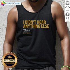 Brice Turang wearing a signature tank top at a Milwaukee Brewers game, showcasing team spirit and style.
