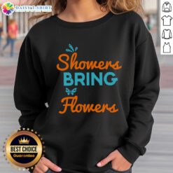 Cozy sweatshirt featuring 'Happy April Showers Bring May Flowers' design, perfect for spring fashion and rainy day comfort.