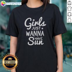 Happy girls wearing a 'Just Wanna Have Sun' Christmas tee, enjoying a sunny holiday gathering outdoors.