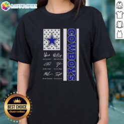 Ladies tee featuring Dak Prescott and Dallas Cowboys players with US flag and signatures, perfect for fans.