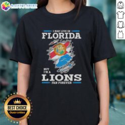 Florida ladies tee featuring 'I May Live In Florida But I'm A Lions Fan Forever' design for passionate Detroit Lions fans.