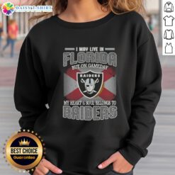 Raiders sweatshirt with 'I May Live In Florida But On Gameday My Heart And Soul Belongs To Raiders' slogan.
