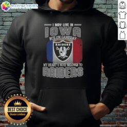 Person wearing a Raiders hoodie in Iowa, showcasing pride with 'Gameday My Heart and Soul Belongs to Raiders' design.