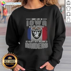 Cozy Raiders sweatshirt with 'I may live in Iowa, but on game day my heart and soul belongs to Raiders' printed design.