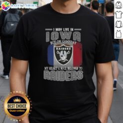 Nice I May Live In Iowa But On Gameday My Heart And Soul Belongs To Raiders T-Shirt displayed on a hanger.