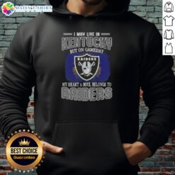 Fan wearing a 'Nice, I May Live in Kentucky But On Gameday My Heart and Soul Belongs to Raiders' hoodie, showcasing team pride.